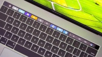 配触控屏的苹果 MacBook 专利获批,显示争议 Touch Bar 回归