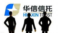 董事长锤伤总经理背后：华信信托股权关系盘根错节 激进扩张踩雷