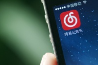 丁磊慢“炖”网易云